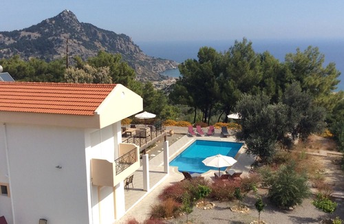 Archangelos Villa | Luxury Villa. Overlooks Tsampika Beach. Large private pool. 4 bedrooms.