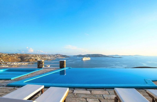 Agios Stefanos House | My Rental Homes - The Rose Flat shared pool air conditioning
