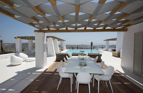 Tourlos Villa | My Rental Homes - Villa Opallia with spacious living and dining areas and a pool