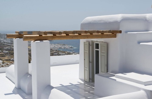 Tourlos Villa | My Rental Homes - Villa Opallia with spacious living and dining areas and a pool