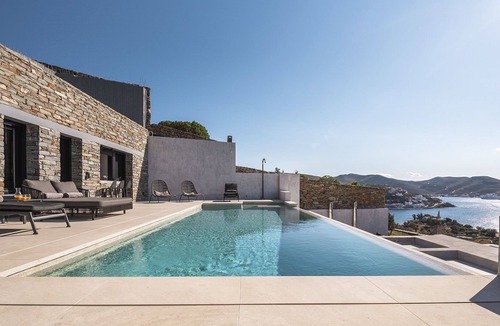 Vourkari Villa | My Rental Homes - Villa Kronos with lounge area and a heated Jacuzzi-plunge pool.