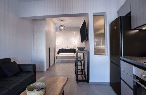 Vivlos Apartment | Næxon Vivlos Grey Roof Apartment with Shared Terrace, Wi-Fi and Air Conditioning