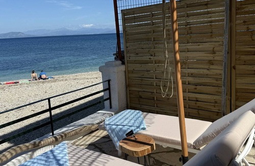 Benitses Apartment | Newly renovated luxury apartment on the beach with large sea front patio