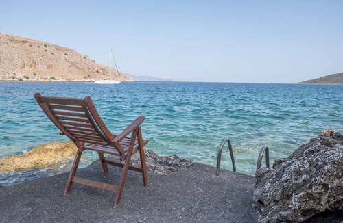Galaxidi Villa | Nisaia is a villa with a small garden with barbeque next to the sea.