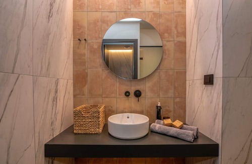 Trachilos House | Nusa retreat - 6-bedroom sea-view residence with private pool and garden