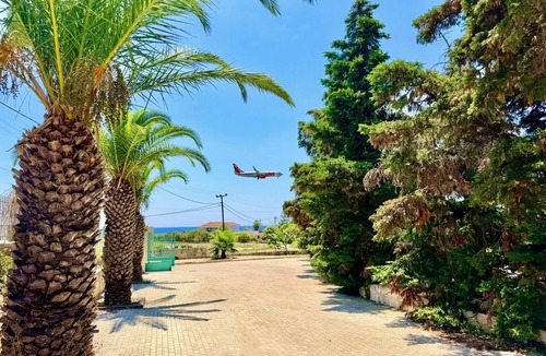Svoronata House | Palm Villa Ammes | Luxury Estate Pool Tennis Court Steps from Ammes Beach