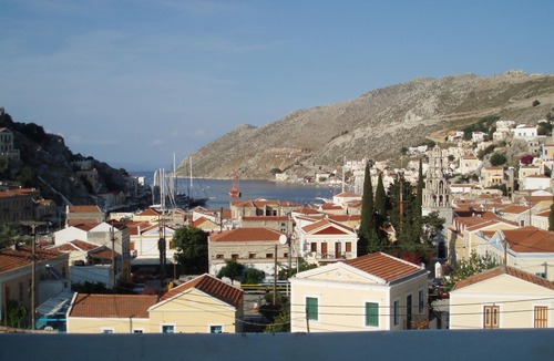 Symi House | Pretty village house with very nice view over Symi harbour from large terraces.