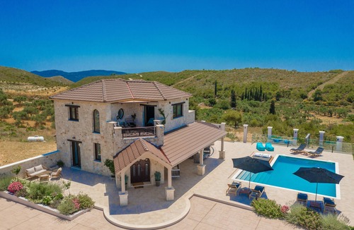 Agia Marina Villa | Private stone villa with heated pool & large outside area, set alone on hillside