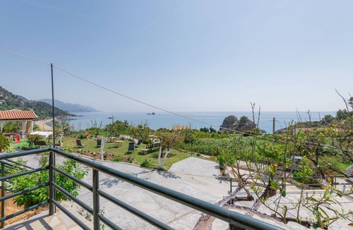 Sinarades Apartment | Rainbow apartment A,Pelekas beach,40 meters from the sea