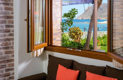 Milatos Beach Apartment | "Seaside Studios", BY THE SEA, in a colorful garden! Ideal for couples
