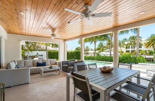 Singer Island Villa | Seven Palms Waterfront- Private Dock, Heated Pool & Lanai -Walk to beach! by Maven Vacation Rentals