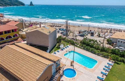 Agios Gordios Apartment | Studio Apartment 'Mires House Side First Floor 10' with Shared Pool, Wi-Fi and Air Conditioning