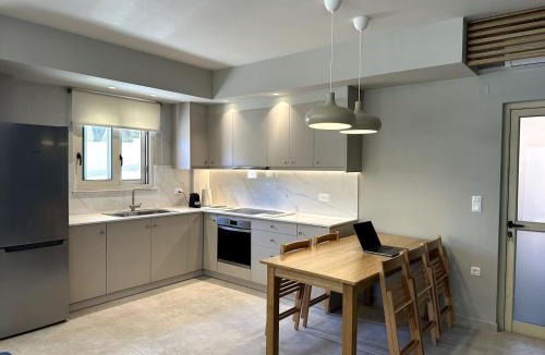 Gerani Apartment | Sunny flat among olive trees, next to the beach