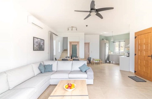 Lygaria Villa | Swimming pool with view to the sea.
