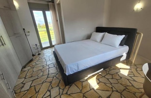 Aigialeia House | Temeni windmills