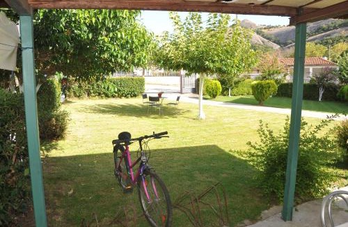 Kalambaka Apartment | The Other Side of Meteora with lush garden, BBQ & pavillion