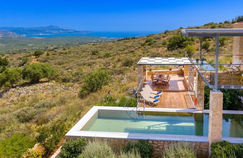 Apokoronas Villa | Villa Kaminia, state-of-the-art architecture with indoor-outdoor catwalk pool