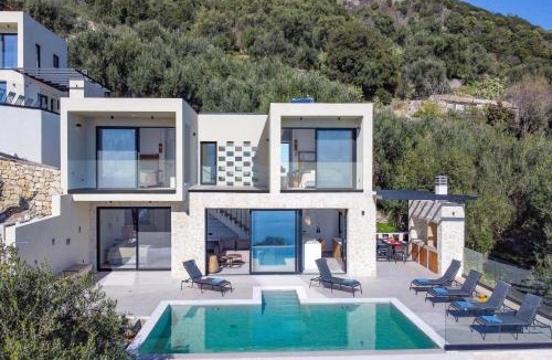 Petaleia Villa | Villa Nissaki View 1 by Villa Plus