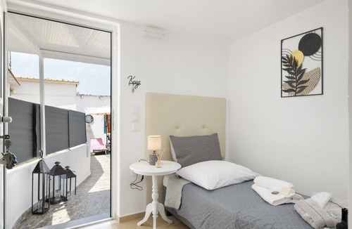 Fanai Apartment | Village Suite 102 Studio with Shared Pool and Terraces with Views—Perfect for Kitesurfers