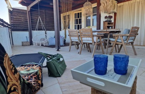 Kokinos Pirgos House | Vintage chic seaside maisonette is located on just a few meters from the beach.