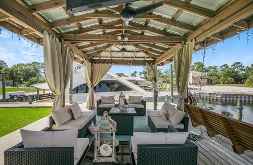 Orange Beach Villa | Water front home with boat dock, boat use, fishing swimming biking & more