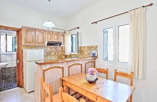 Agni Apartment | Zoulis Eleni: A traditional village apartment in Kalami, just a few steps away from the beach