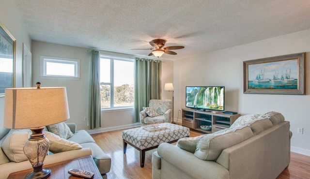 Second-floor condo with river views and access to a community pool in Folly Beach
