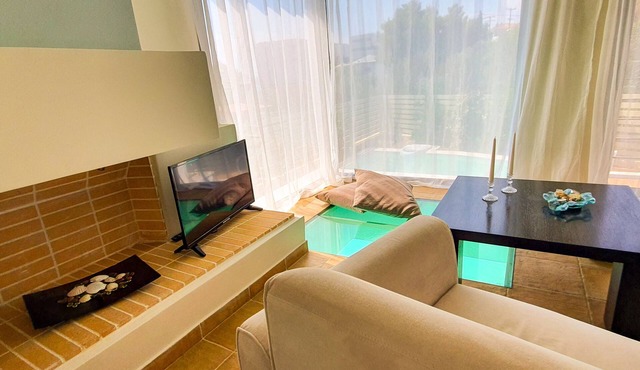 Unique 2 bedroom apartment with garden and pool