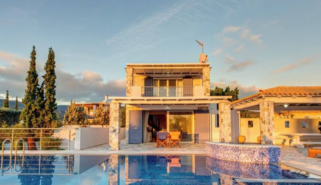 Villa Mare Magna, The villa spans approximately 200 sq.m. across three levels, offering a serene and