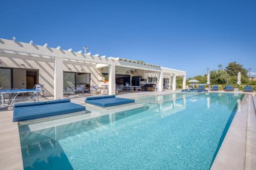 Villa Serenissima - Beachfront Villa with Indoor & Outdoor Pools and Gym by Posarelli Villas