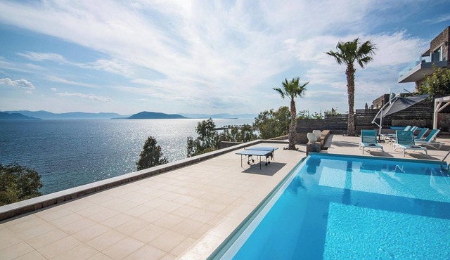Welcome to Red Rock Villa, a serene seafront retreat for pure relaxation