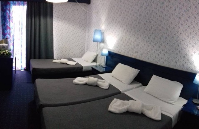Beachfront Triple Room- Argo Seaside Stays
