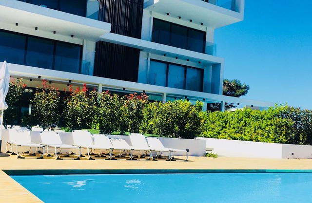 New modern ground duplex 310m2 with large private pool and garden near the sea.
