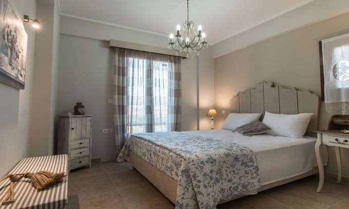 Agios Prokopios Apartment | One-Bedroom Apt with Side Sea View, Ground Floor - Gratsias Luxury Apartments