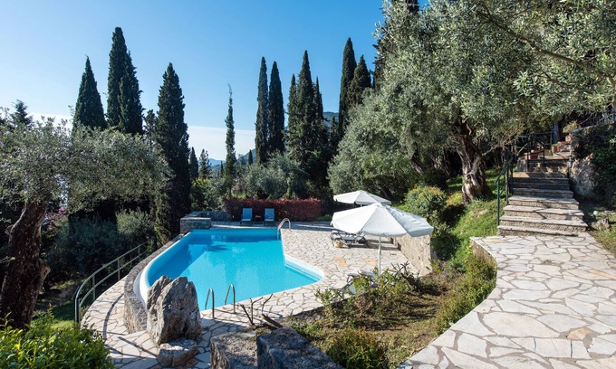 Benitses Villa | Traditional details while in harmony with modern and minimal decoration
