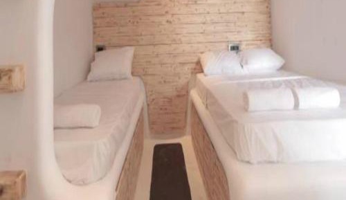 Single Bed in Dormitory Room
