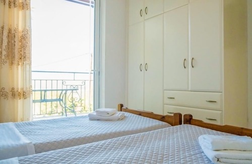 Pitharion Villa | Villa Afroditi near Airport with Pool, Free Wi-Fi, Souda Bay Views, Garden Oasis