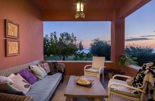 Agios Matthaios House | Idyllically situated and luxurious villa with a veranda and a gazebo