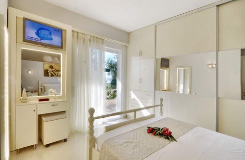 Perama House | Homerez - Nice house 500 m away from the beach for 4 ppl. with garden at Corfu