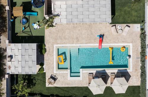 Perama Villa | Koin Villa Sunset, With Heated Pool & Whirlpool, By ThinkVilla