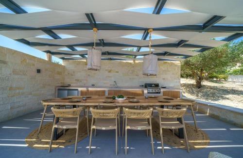 Adele Villa | Lefkothea Villas with Large Pool, BBQ & Playground by Rentado