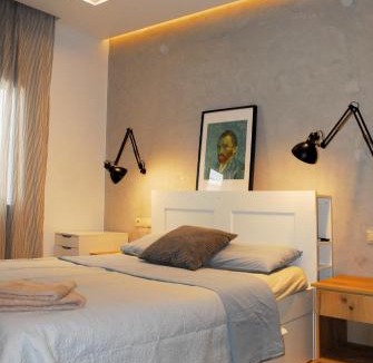 Heraklion Apartment | Modern house with garden and bathroom TV in front of the Venetial Walls