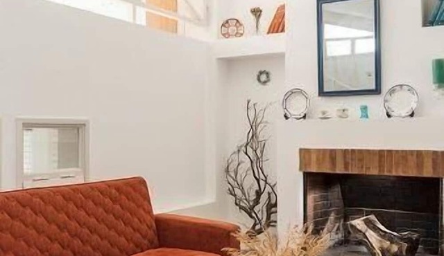Holiday home next to orange tree orchard